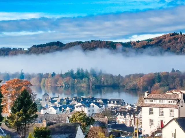 Bowness On Windermere on an early morning with fog and mist rising on lake Windermere. Autumn in the Lake District 43 jpg